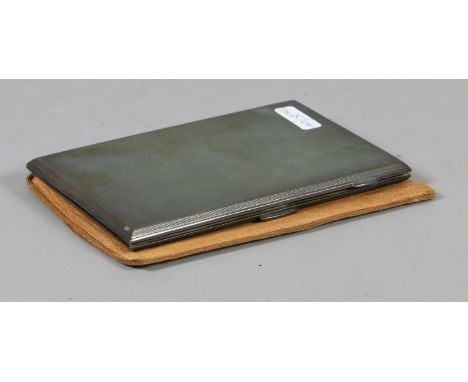 A cased silver cigarette case with engine turned engraving assayed Birmingham, 202 grams.