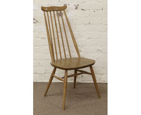 An Ercol Golden Dawn spindle back kitchen chair.