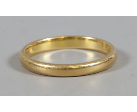 A plain 22ct gold wedding band, size M, 3.2 grams.