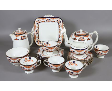 A Grafton china part tea service decorated with flowers (approximately twenty two pieces).