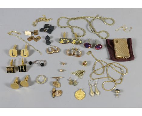 A box of gilt metal jewellery including cufflinks, earrings and a lighter etc.