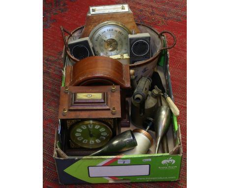 A box of metalwares and mantel clocks to include a brass blow lamp and walky-talky.