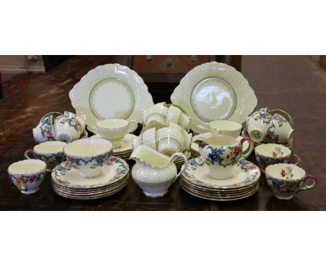 A Paragon thirty seven piece tea service decorated with The Regency design along with a Royal Cauldon Victorian pattern part 