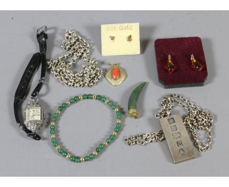 A box of mixed jewellery including silver ingot on chain, ladies marcasite cocktail watch, jade bracelet and pendant,pair of 