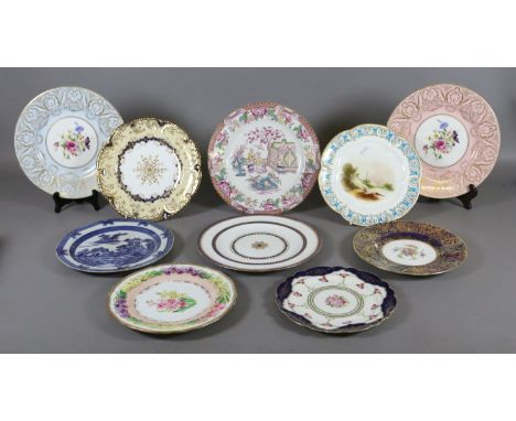 A collection of English china and pottery plates including Royal Crown Derby, Royal Worcester and Mintons.