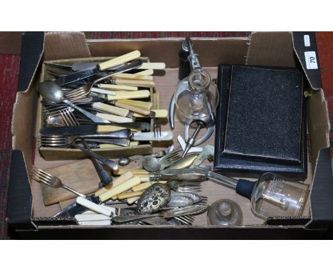 A box of flatwares to include cased sets along with a Cona coffee perculator and Swiss made nutcracker.