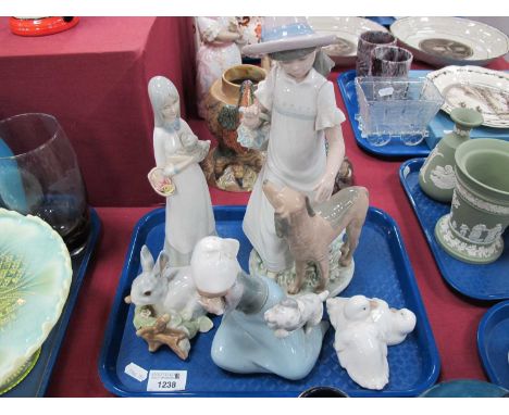 Lladro Rabbit and Shielding The Cat (with faults), Nao lady and dog, and two others.
