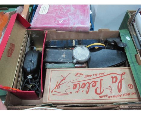 A boxed La Pelote game set, writing instruments in fitted case, heavy metal hole punch, boxed Minicine, pewter hip flask with