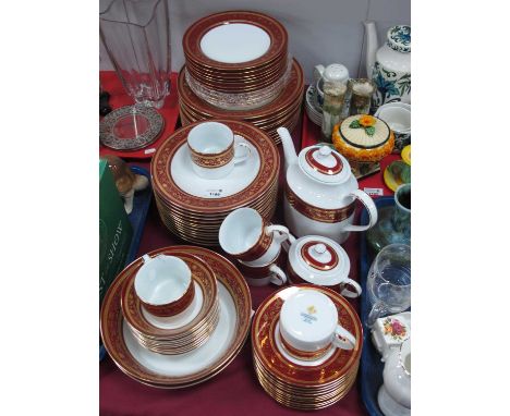 Dankotuwa 'Legacy Red' Dinner Ware, of sixty-four pieces, including coffee pot, sucrier, and eleven dinner plates.