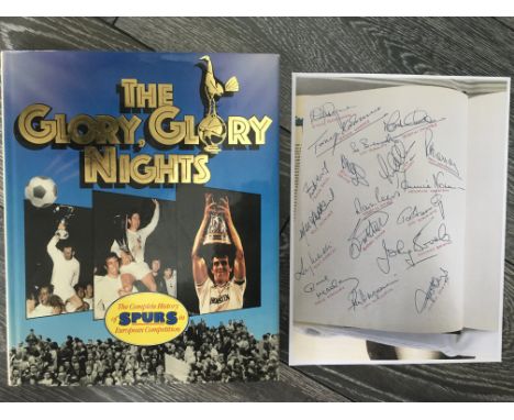 Tottenham Signed Glory Glory Nights Football Book: Inside blank white page is hand signed in blue biro by 18 players and pers