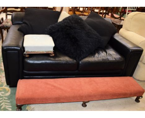 A contemporary sofa, 175cm wide; an early 20th century sofa length footstool; another (3)