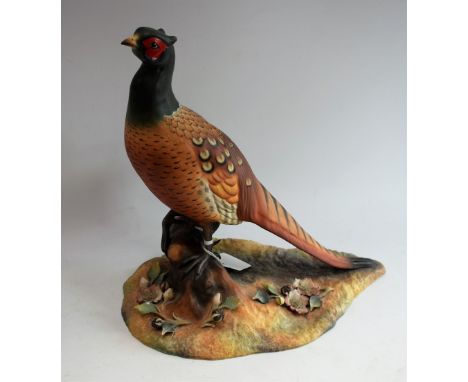 A Royal Crown Derby model, of a pheasant, naturalistically modelled, signed K Wood, 27cm high, boxed