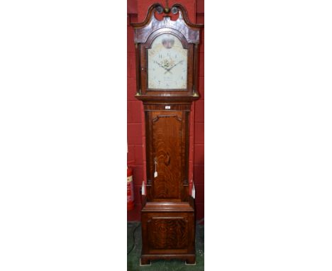 A George III oak and flame mahogany longcase clock, 31cm arched painted dial, Arabic chapter, the arch painted with a lady dr