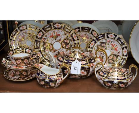 A Royal Crown Derby 2451 pattern tea for two, comprising boat shaped teapot and cover, cream jug, two handled sugar bowl and 