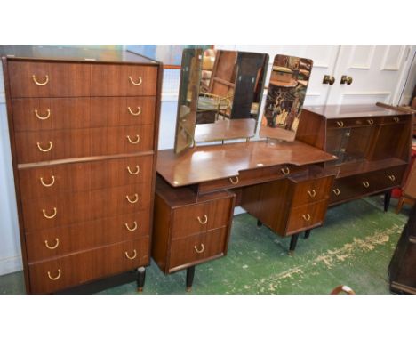 A retro mid-20th century G Plan side cabinet, rectangular top above an arrangement of drawers, a fall front door and a pair o