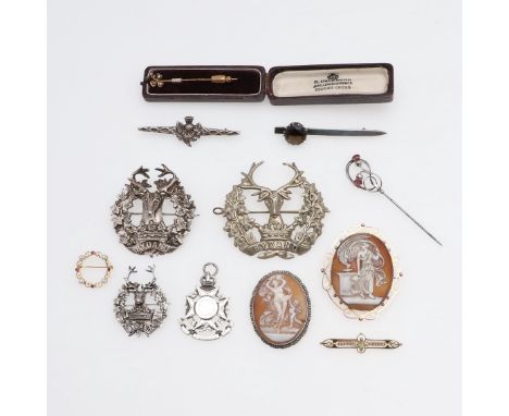 including a 9ct gold brooch mounted with circular-cut peridots and half pearls, a gold, pearl and gem set circle brooch, a ca