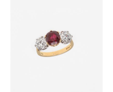 the cushion-shaped ruby weighs 3.08 carats and is set with two circular brilliant-cut diamonds, in 18ct gold, signed G & Co t