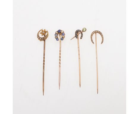 together with three gold and gem set horseshoe stick pins, total weight 5.1 grams. *CR All with some wear.