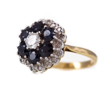 SAPPHIRE AND DIAMOND RING,set with a central round brilliant cut diamond of approximately 0.30 carats, within a double halo o