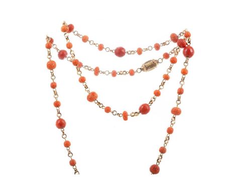 TWO CORAL NECKLACES AND A PAIR OF EARRINGS,including a string of coral beads, a carved coral necklace and two pairs of earrin