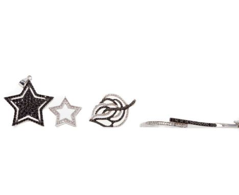 THREE GEM SET PENDANTS AND A BANGLE,including a black diamond star pendant, marked 925, along with a smaller example, marked 