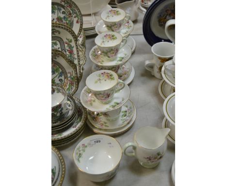 A Royal Doulton Apple Blossom pattern tea service, for six, comprising cups, saucers, plates, milk jug and sugar bowl, no. H4