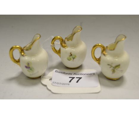 A Royal Worcester miniature flat sided jug, painted by  J Smyth, signed, with irises, 3.5cm high, printed crown and circle ma
