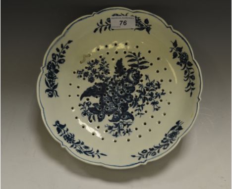 A Worcester Pomegranate pattern shaped circular strainer dish, printed with pomegranate, peony and foliage, the border with s