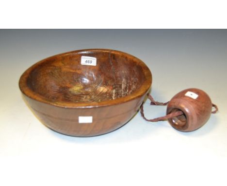 A hand carved oak bowl; a a turned bobbin weight 
