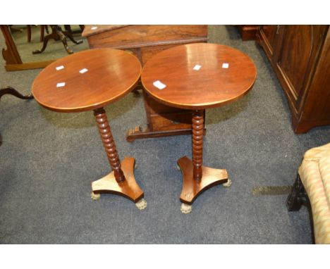 A pair of stained' mahogany' occasional tables, bobbin turned support, brass cast pad feet.
