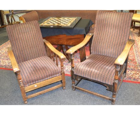 A Victorian mahogany sofa, turned supports; a pair of fireside oak recliners, c.1930 (3)