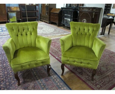 A PAIR OF BEECHWOOD AND GOLD UPHOLSTERED ELBOW CHAIRS each with a deep button upholstered back and seat on moulded legs