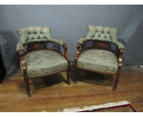 A FINE PAIR OF EDWARDIAN ROSEWOOD AND UPHOLSTERED TUB SHAPED CHAIRS each with a deep button upholstered back and seat with sc