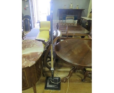 A CHROME AND BLACK PAINTED METAL FLOOR STANDARD LAMP c.1930 the square stepped column raised on a stepped moulded base with b