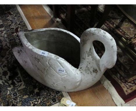 A COMPOSITION STONE PLANTER modelled as a swan 40cm high