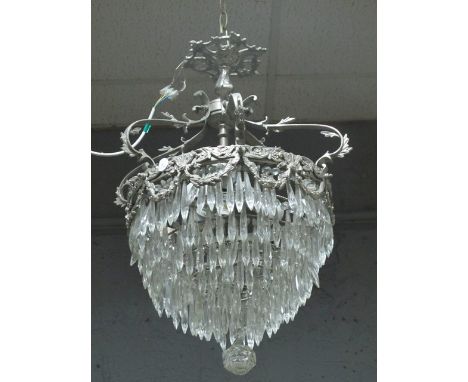 A CONTINENTAL CHROME AND CUT GLASS FOUR LIGHT CHANDELIER hung with cascading pendants 77cm drop
