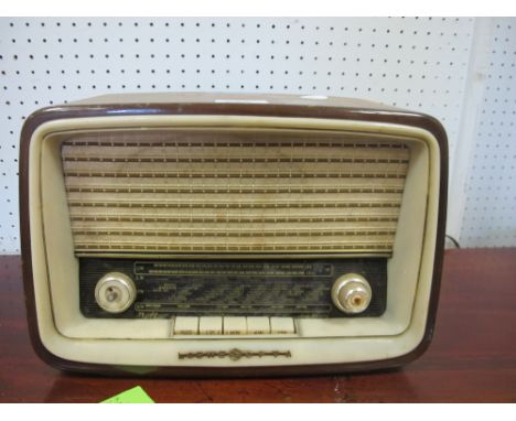 A NOEWE OPTA VALVE RADIO together with an Edwardian mahogany inlaid cased mantle clock