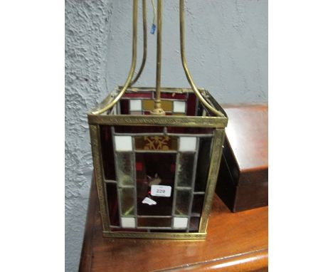 A VICTORIAN BRASS LEAD GLASS AND COLOURED GLASS SINGLE LIGHT HALL LANTERN 