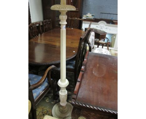 A CREAM PAINTED FLOOR STANDARD LAMP the reeded and knoped column above a circular spreading foot with shade 172cm (h)