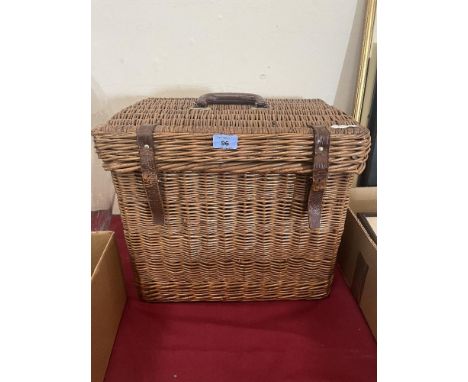 A wicker hamper. 15' high
