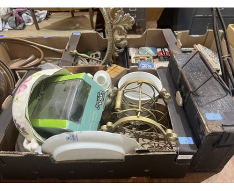 A metal mirror frame, an ammunition box, desk lamp etc.