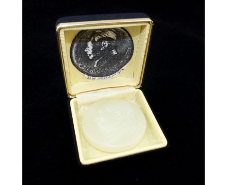 A 1950s Chinese carved pale celadon jade cameo portrait medallion of Chairman Mau.
