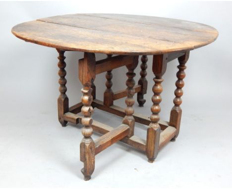 17th century and later dropleaf table, the bobbin turned legs joined by peripheral stretchers, 114cm w 