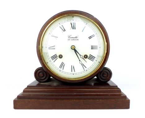 Comitti mantel clock, mahogany, brass movement.
