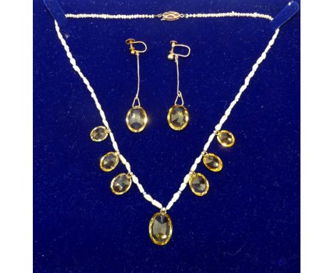 Pearl and citrine necklace, with an arrangement of seven pendant stones, with a pair of ear pendants, also including two furt