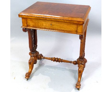 Victorian burr walnut games / work table, the hinged swivel top enclosing inlaid backgammon, chess and cribbage surfaces over