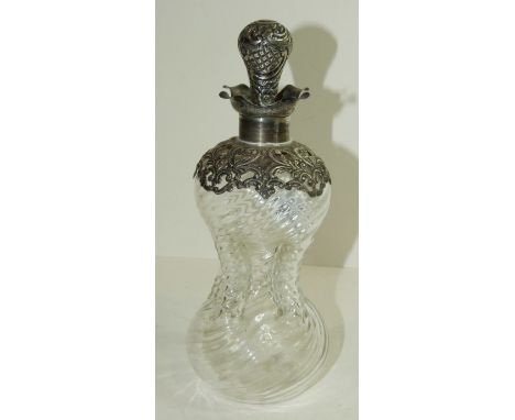 A small pinched glass decanter with pierced silver mounts, marks rubbed.