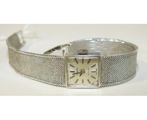 Tissot, a lady's Tissot "Stylist" wrist watch with 9ct white gold mesh strap, total weight 23.7g, (a/f).