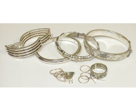 An Emporio Armani silver gate link bracelet, a Links of London silver hinged bangle, two other silver bangles and other items