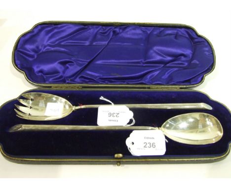 A cased pair of late Victorian silver salad servers of plain form by William Hutton & Sons Ltd, 28cm, 4.3oz.